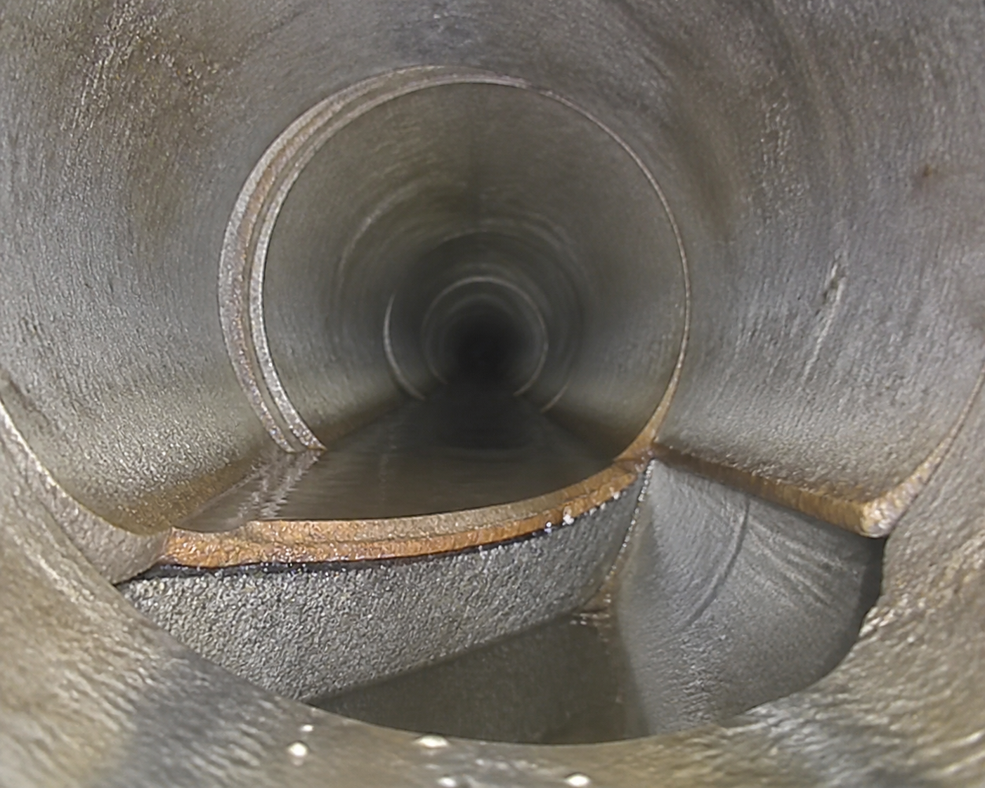 Inspection camera view of an offset joint inside a sewer lateral pipe